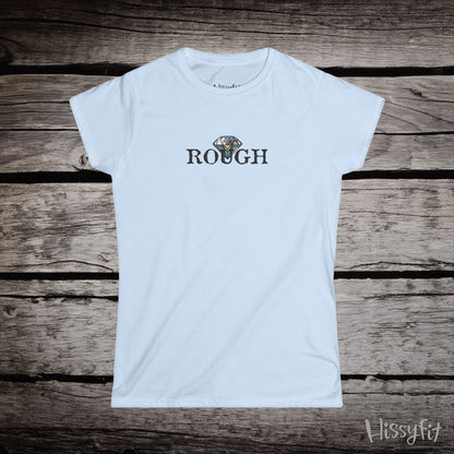 White t-shirt with a graphic diamond in 'Rough' text on a wooden surface, featuring the brand 'Hissyfit'.