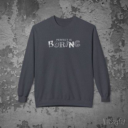 Gray sweatshirt with 'Perfect is Boring' text on a textured gray background