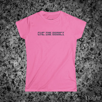 Pink t-shirt with 'FLIP THE SCRIPT' text on a gray granite surface, featuring the brand 'Hissyfit'.