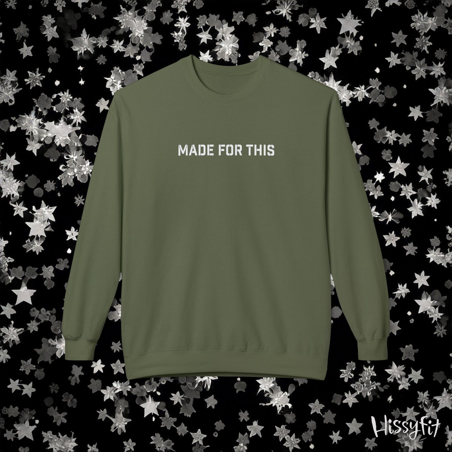 Green sweatshirt with 'MADE FOR THIS' text on a black background with star patterns